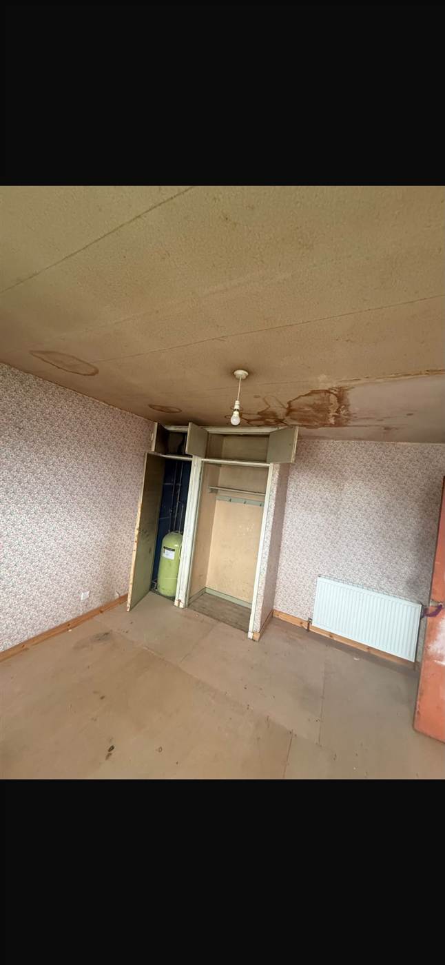 Cleared and cleaned room after a house clearance in Motherwell
