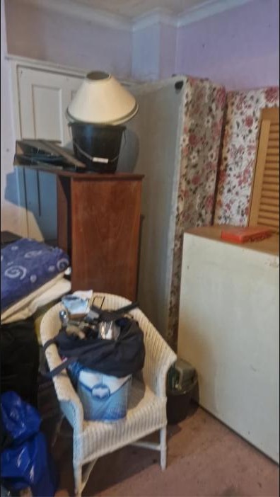 Household furniture and belongings cleared during house clearance in Airdrie, North Lanarkshire