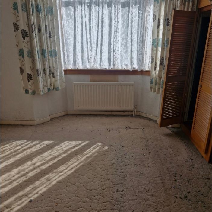 Bedroom and wardrobe cleared during house clearance in Airdrie