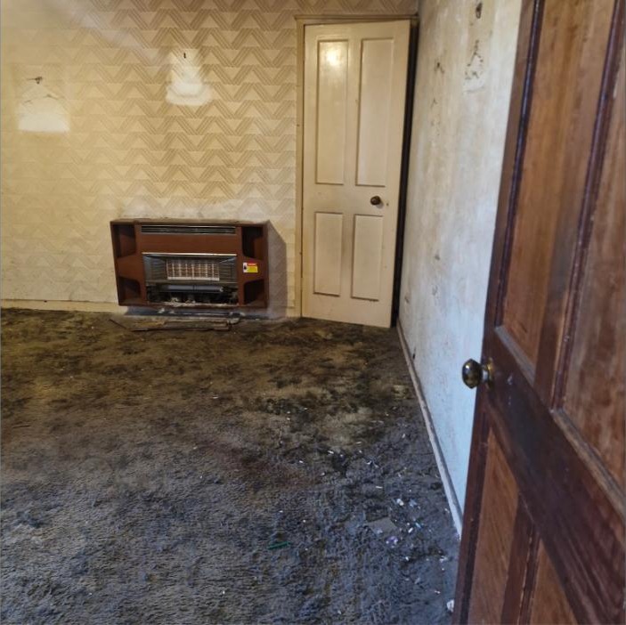 Room cleared of furniture and belongings during house clearance job in Airdrie